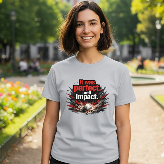 Grey t-shirt with "It was perfect. until impact." and a golf ball graphic.