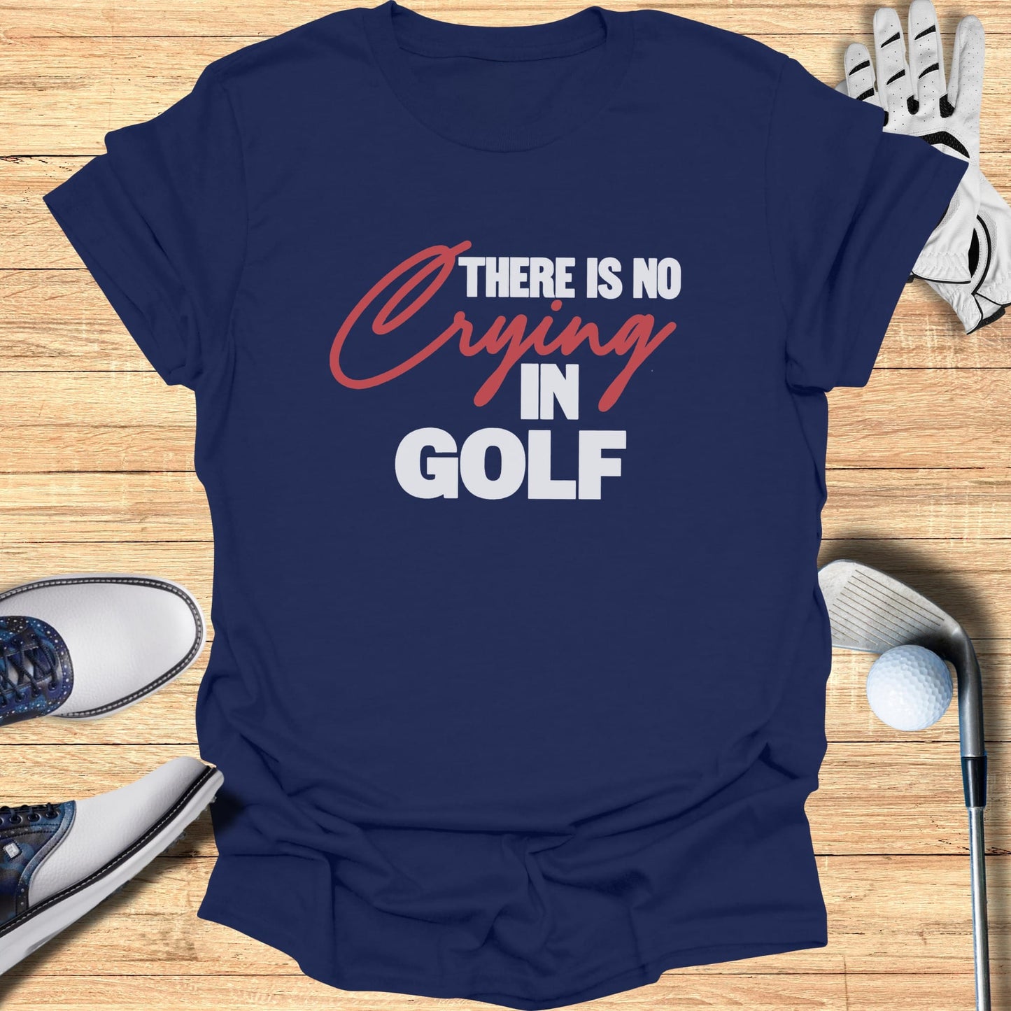 Navy t-shirt with "THERE IS NO CRYING IN GOLF" text in white and red.