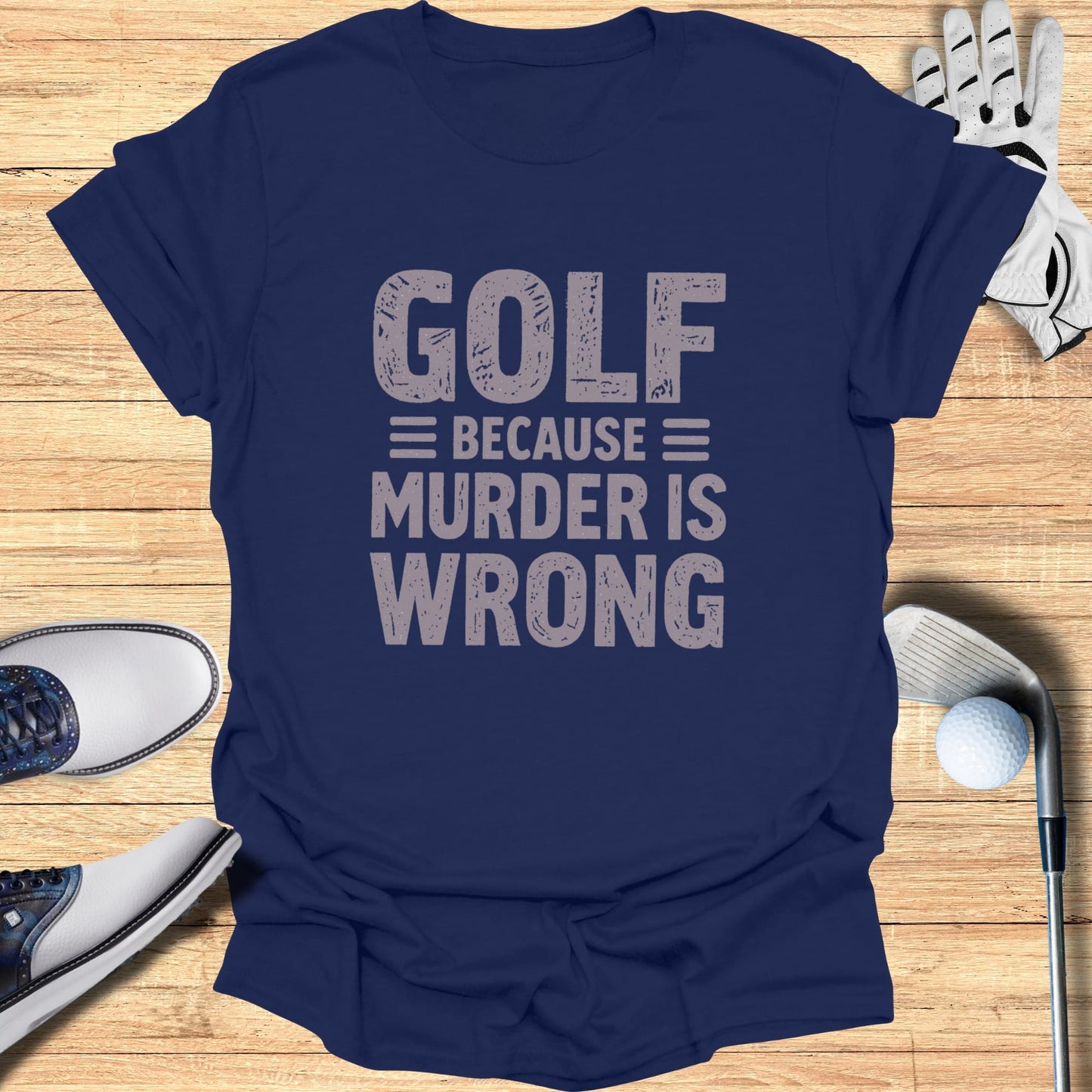 Navy t-shirt with "GOLF BECAUSE MURDER IS WRONG" text.
