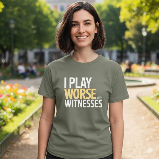 Woman wearing a green t-shirt with "I PLAY WORSE WITH WITNESSES" text.