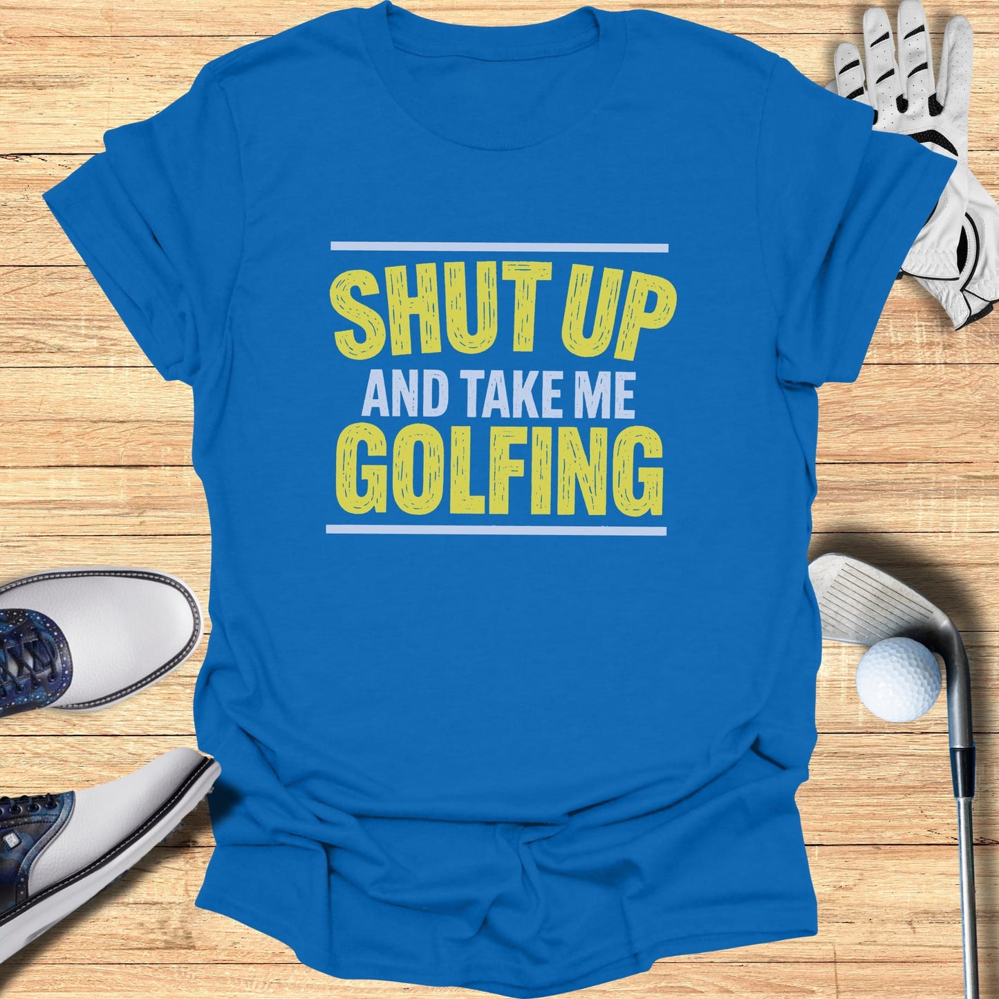 Blue t-shirt with yellow text: "Shut Up and Take Me Golfing".
