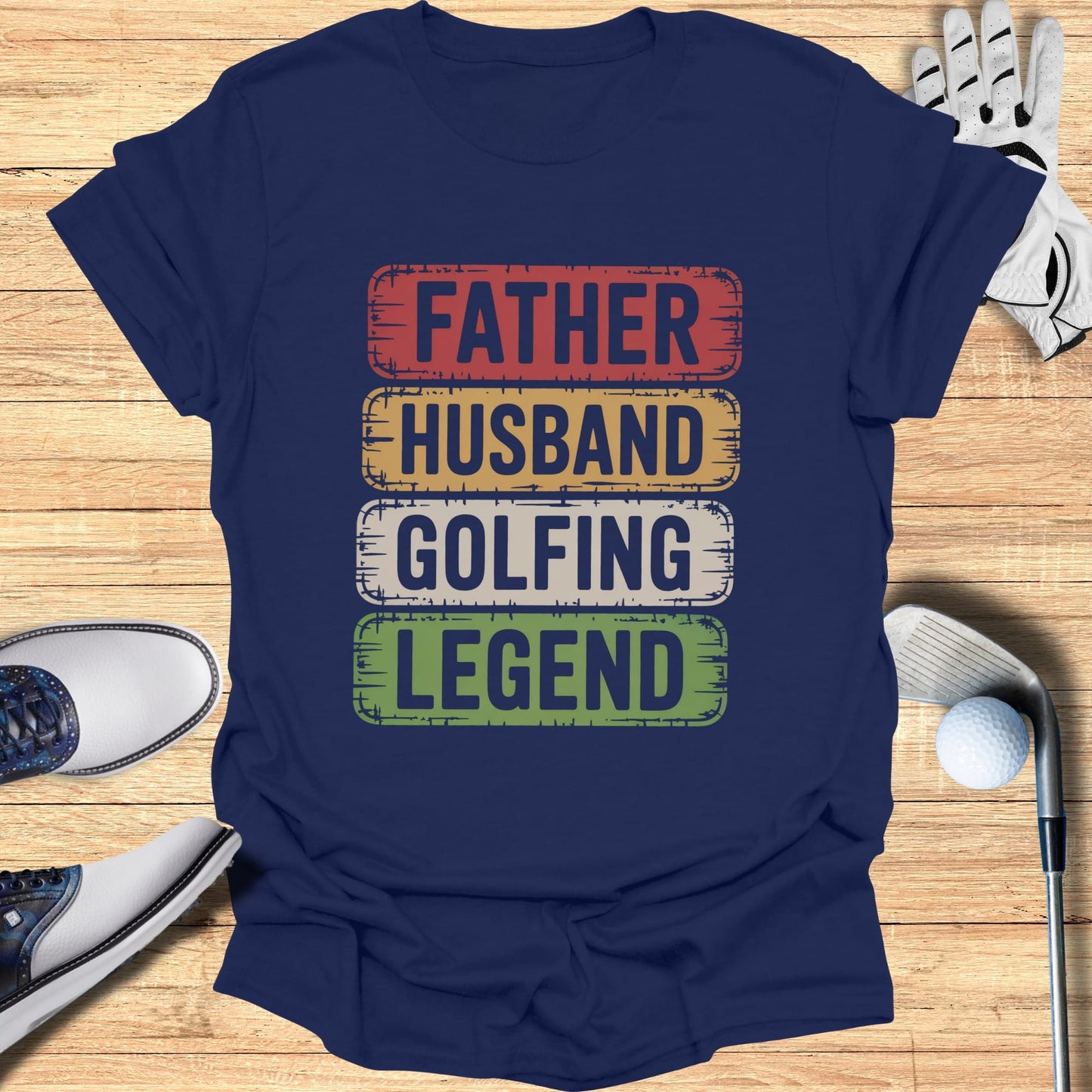 Navy t-shirt with "Father Husband Golfing Legend" text in colored boxes.