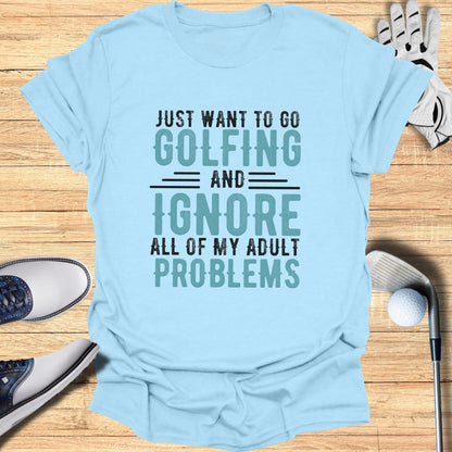 Light blue t-shirt with text: JUST WANT TO GO GOLFING AND IGNORE ALL OF MY ADULT PROBLEMS