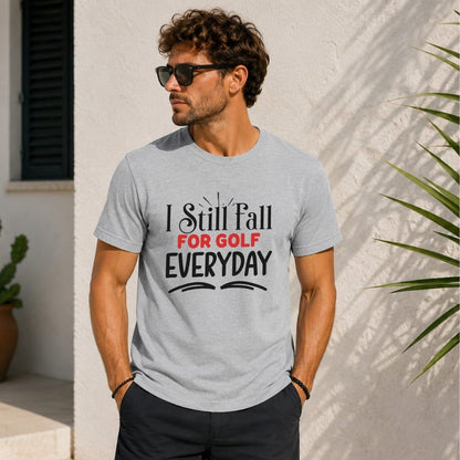 Grey t-shirt with "I Still Fall for Golf Everyday" text.