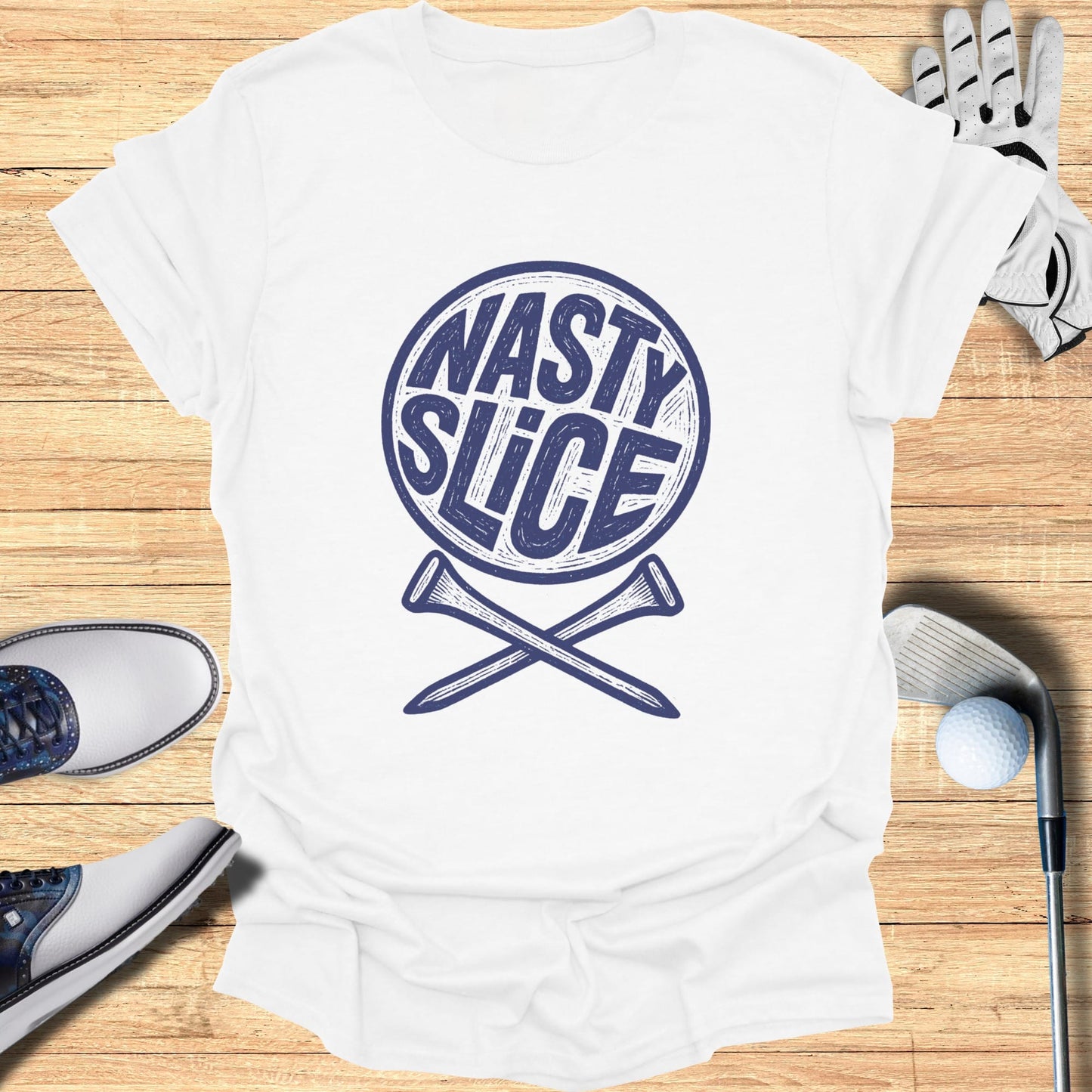 White t-shirt with "NASTY SLICE" text and crossed golf tees.