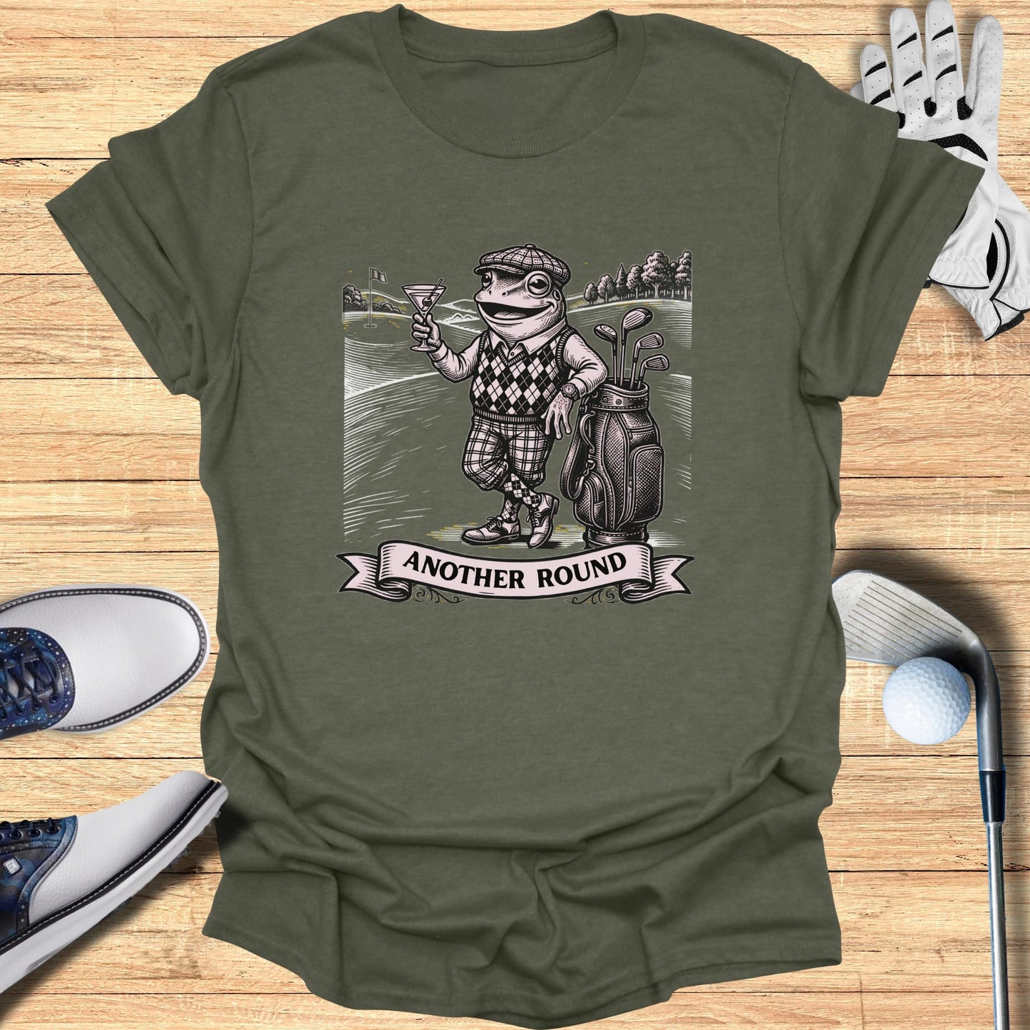 Golfer frog in a flat cap holds a martini next to a golf bag.