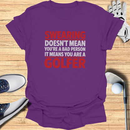 Purple t-shirt with red text: "Swearing doesn't mean you're a bad person, it means you are a golfer."