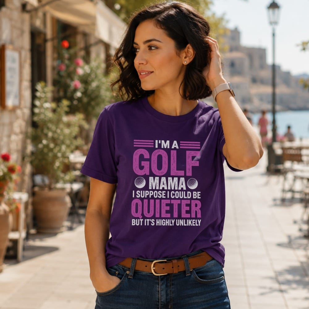 Purple t-shirt with "I'm a golf mama, I suppose I could be quieter but it's highly unlikely" text.