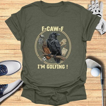 T-shirt with a crow on a branch holding golf clubs, text "F-CAW-F I'M GOLFING!".