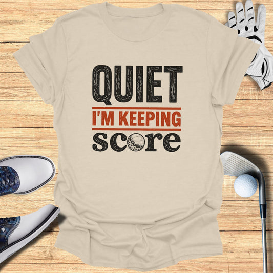 Cream t-shirt with bold black text reading "QUIET" above "I'M KEEPING SCORE".