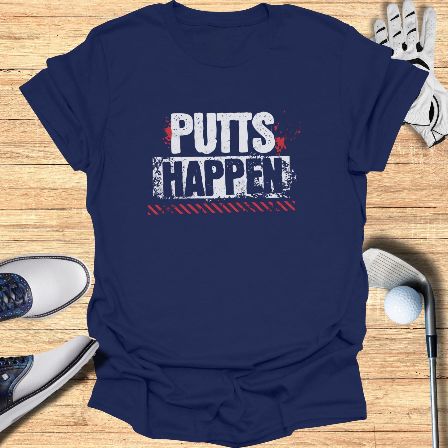 Navy t-shirt with "PUTTS HAPPEN" in distressed white and red lettering.