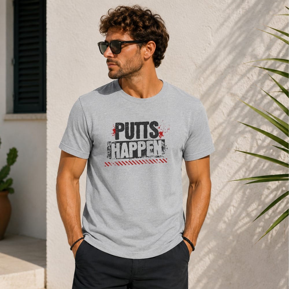 Man wearing a grey t-shirt with "PUTTS HAPPEN" text.