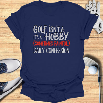 Navy t-shirt with "Golf isn't a hobby, it's a (sometimes painful) daily confession."