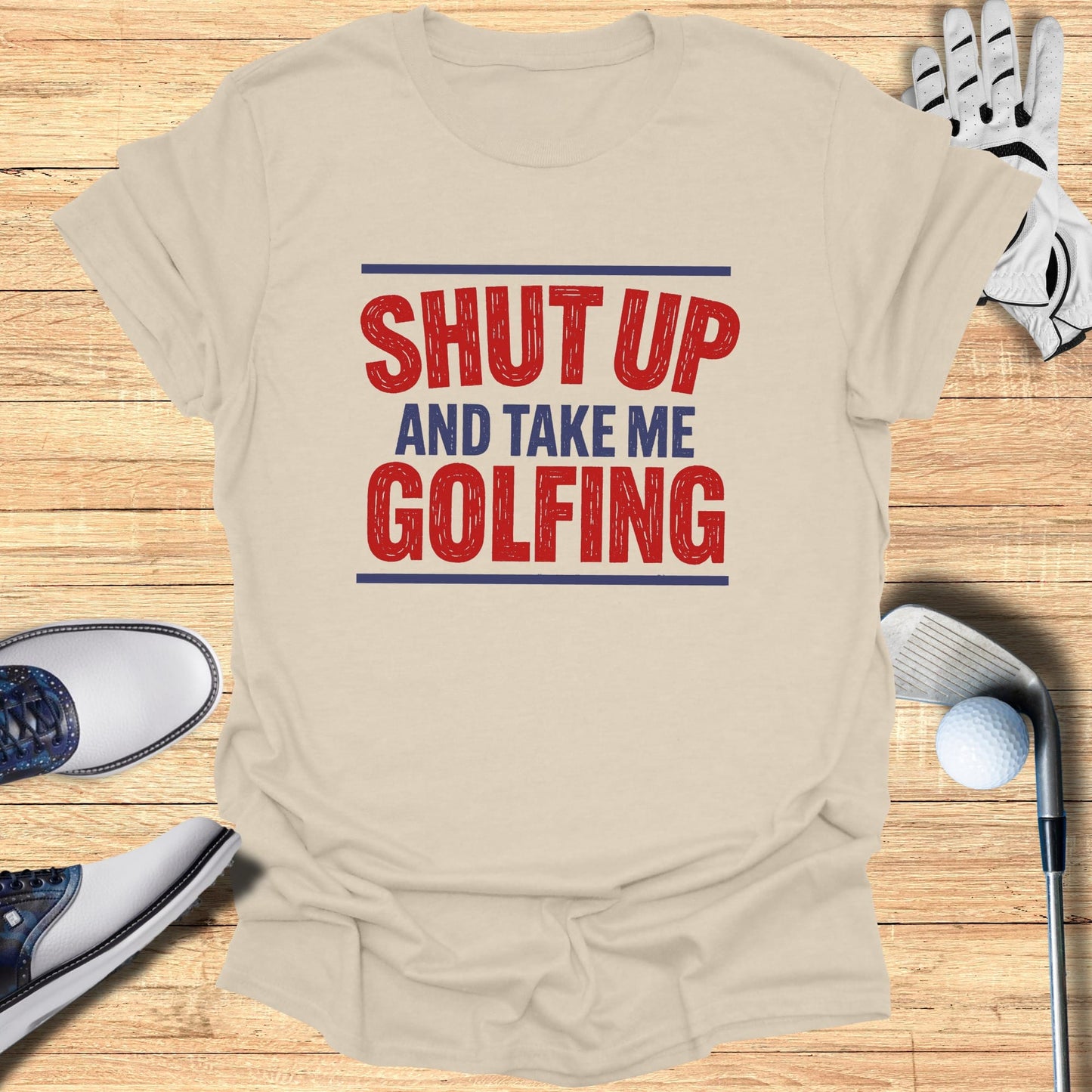 Tan t-shirt with red text reading "SHUT UP AND TAKE ME GOLFING".