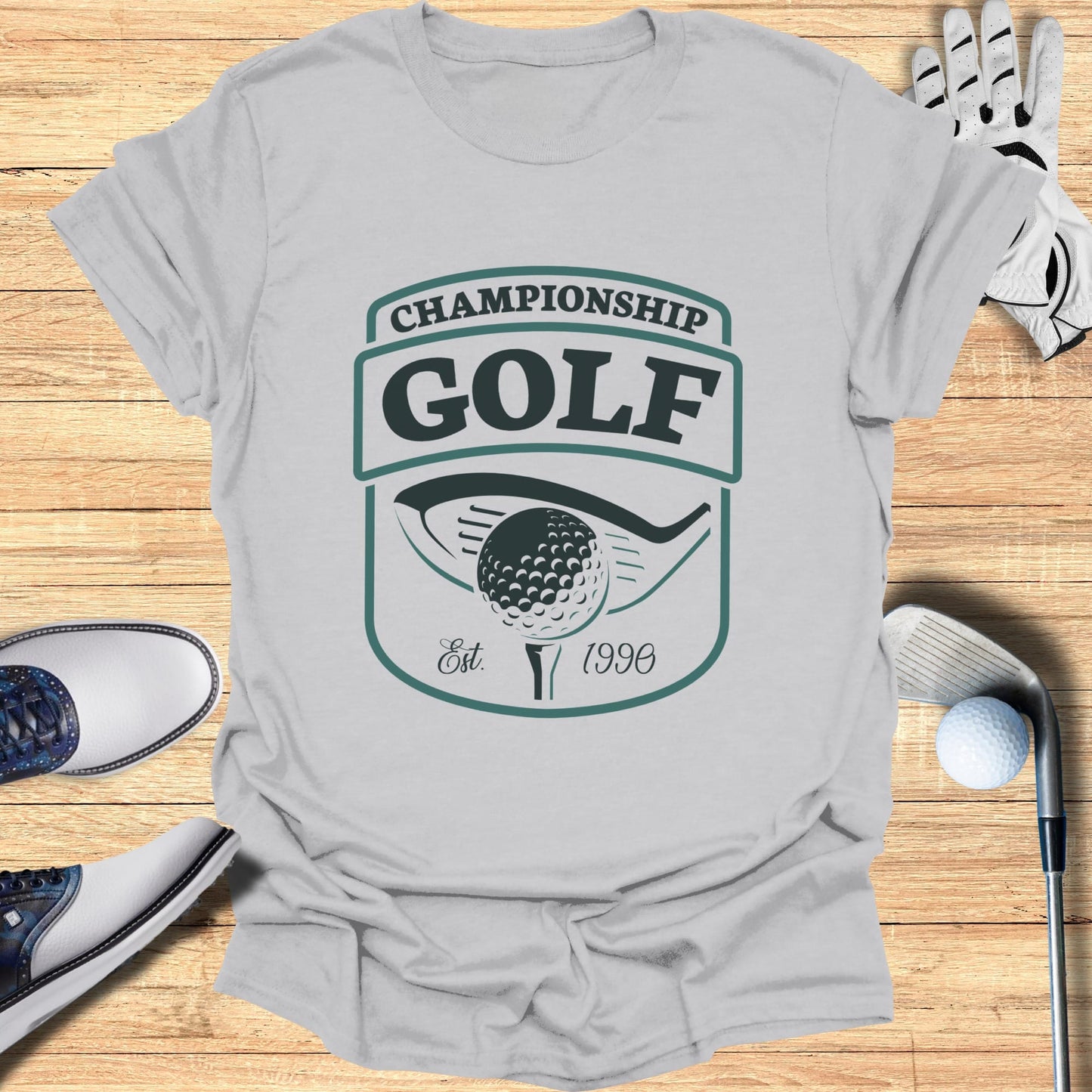 Gray t-shirt with "Championship Golf Est. 1996" logo featuring a golf ball and club.