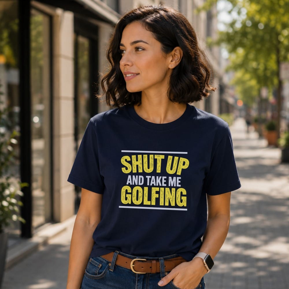 Navy t-shirt with "SHUT UP AND TAKE ME GOLFING" in yellow and white text.
