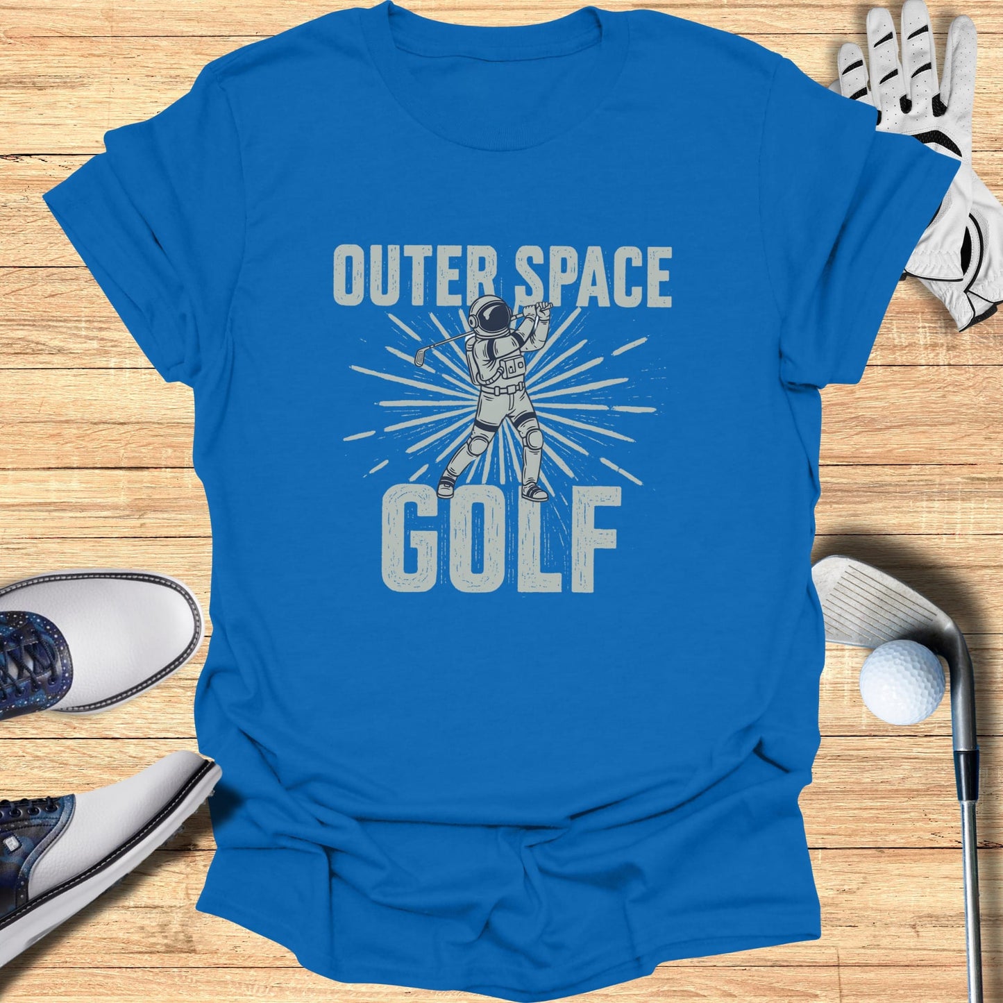 Astronaut swinging golf club with "Outer Space Golf" text.