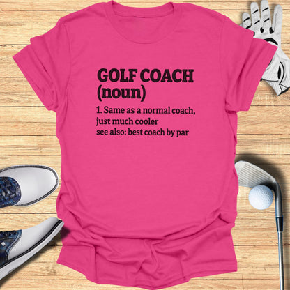Pink t-shirt with "GOLF COACH (noun)" definition.