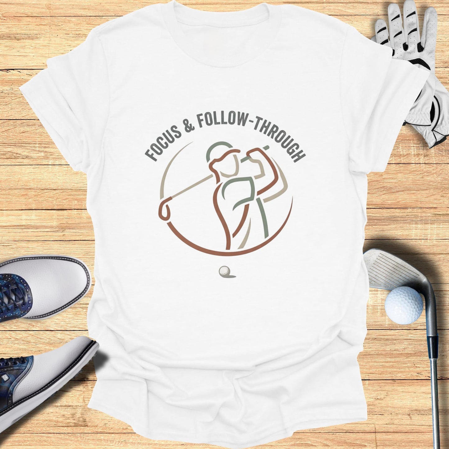 White t-shirt with "FOCUS & FOLLOW-THROUGH" and a golfer logo.