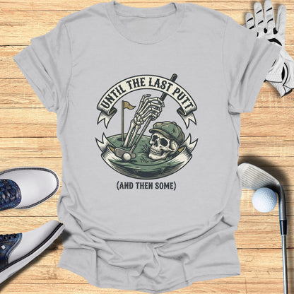 Gray t-shirt with skull golfing graphic and text "UNTIL THE LAST PUTT (AND THEN SOME)".