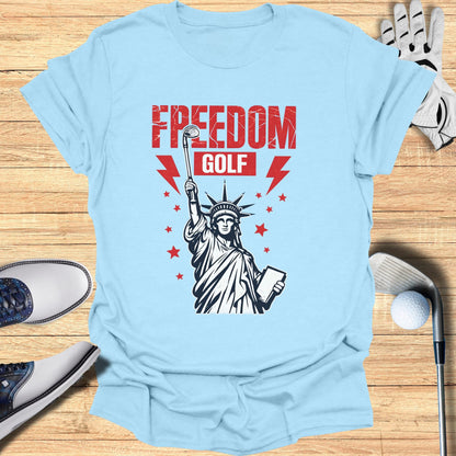 Light blue t-shirt with Statue of Liberty graphic and "FREEDOM GOLF" text.