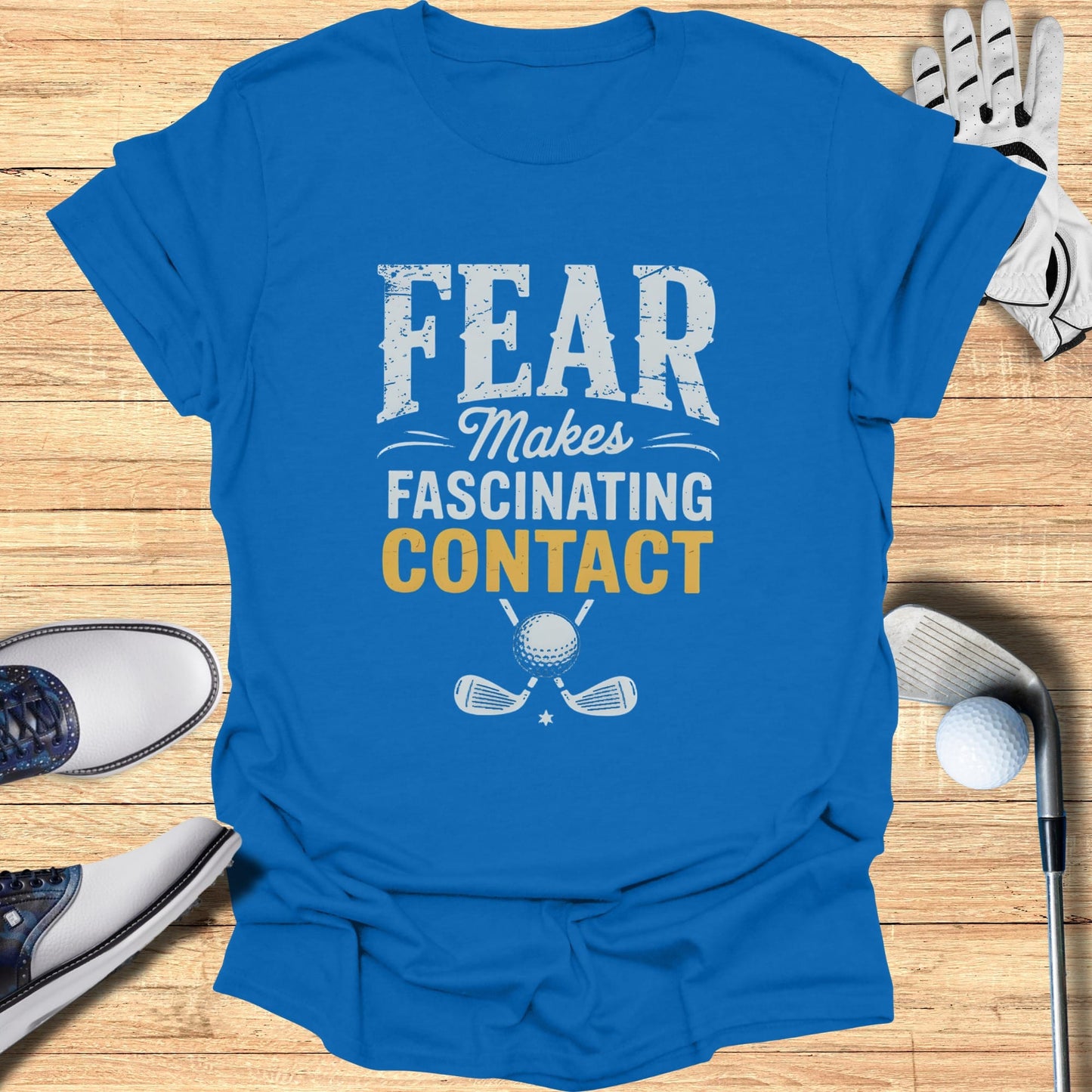 Blue t-shirt with "FEAR MAKES CONTACT" and golf graphics.