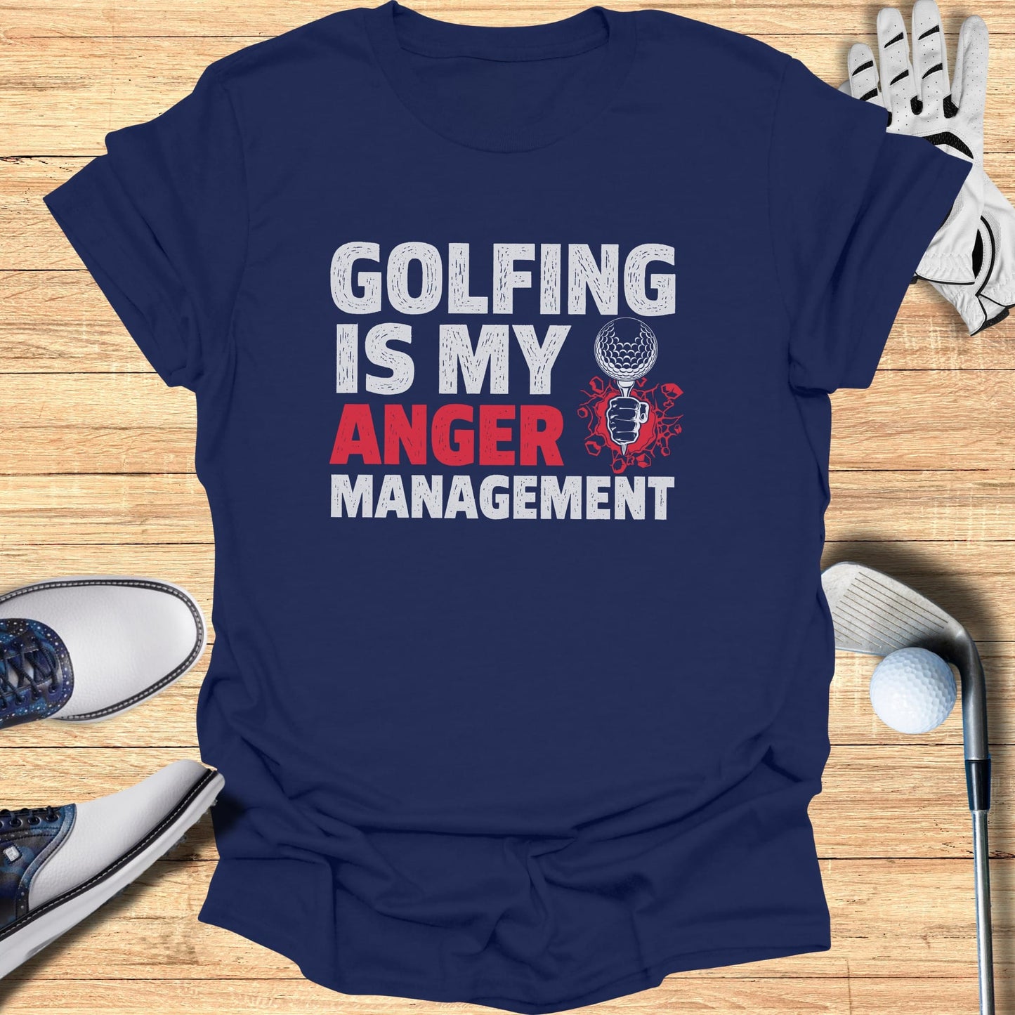 Navy t-shirt with "Golfing is my anger management" text and golf graphics.