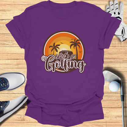 Purple t-shirt with "Let's Go Golfing" text and a sunset graphic.
