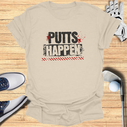 Cream t-shirt with "PUTTS HAPPEN" text, golf clubs, and balls.