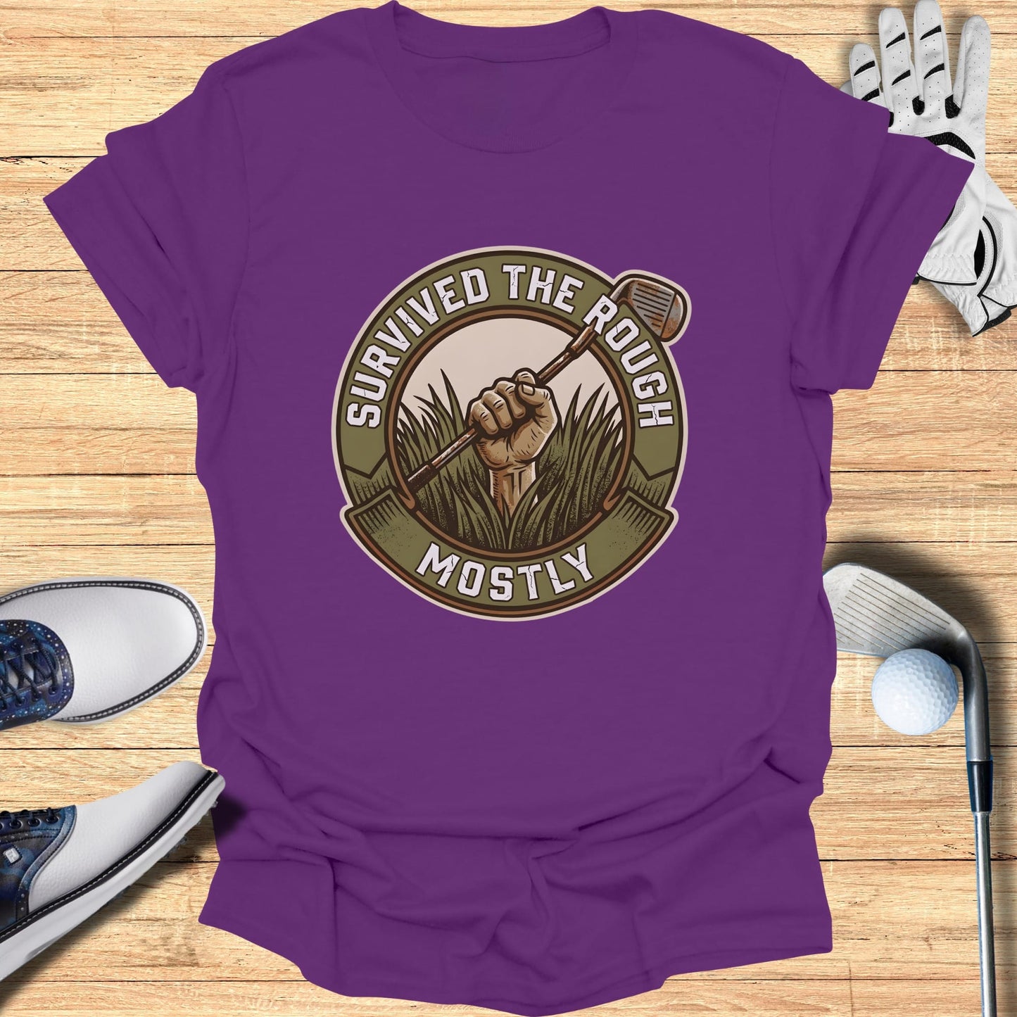 Purple t-shirt with "Survived The Rough Mostly" graphic featuring a golf club.