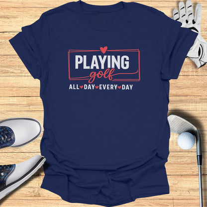 Navy t-shirt with "Playing Golf All Day Every Day" text and heart graphics.