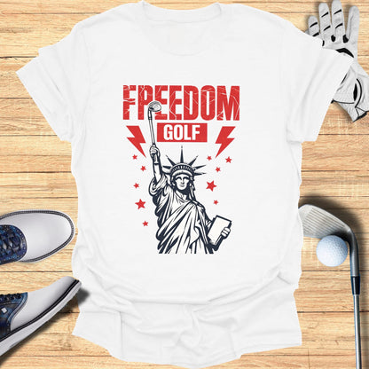 T-shirt graphic: Statue of Liberty holding golf club, "FREEDOM GOLF" text.