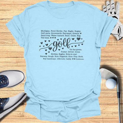 Light blue t-shirt with "golf" and golf terms.