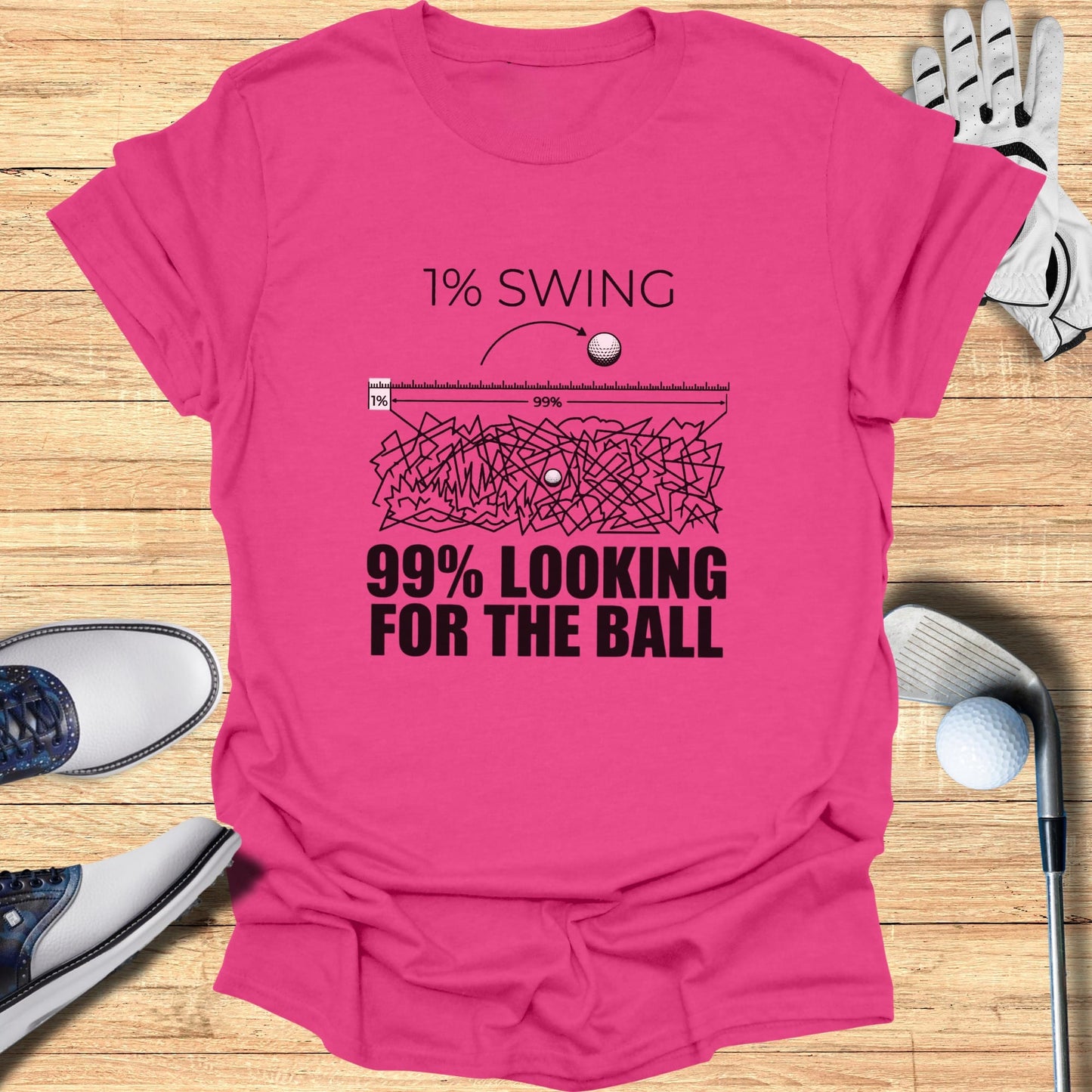Pink t-shirt with "1% SWING 99% LOOKING FOR THE BALL" graphic.