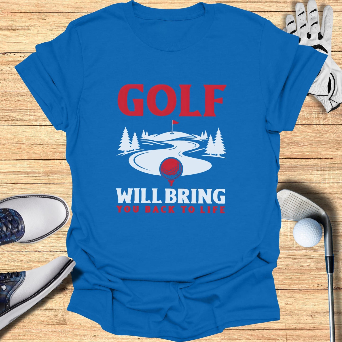 Blue t-shirt with "GOLF WILL BRING YOU BACK TO LIFE" text and golf course graphic.