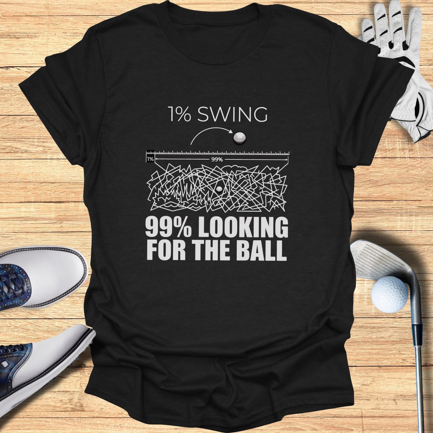 Black t-shirt with "1% SWING 99% LOOKING FOR THE BALL" text.