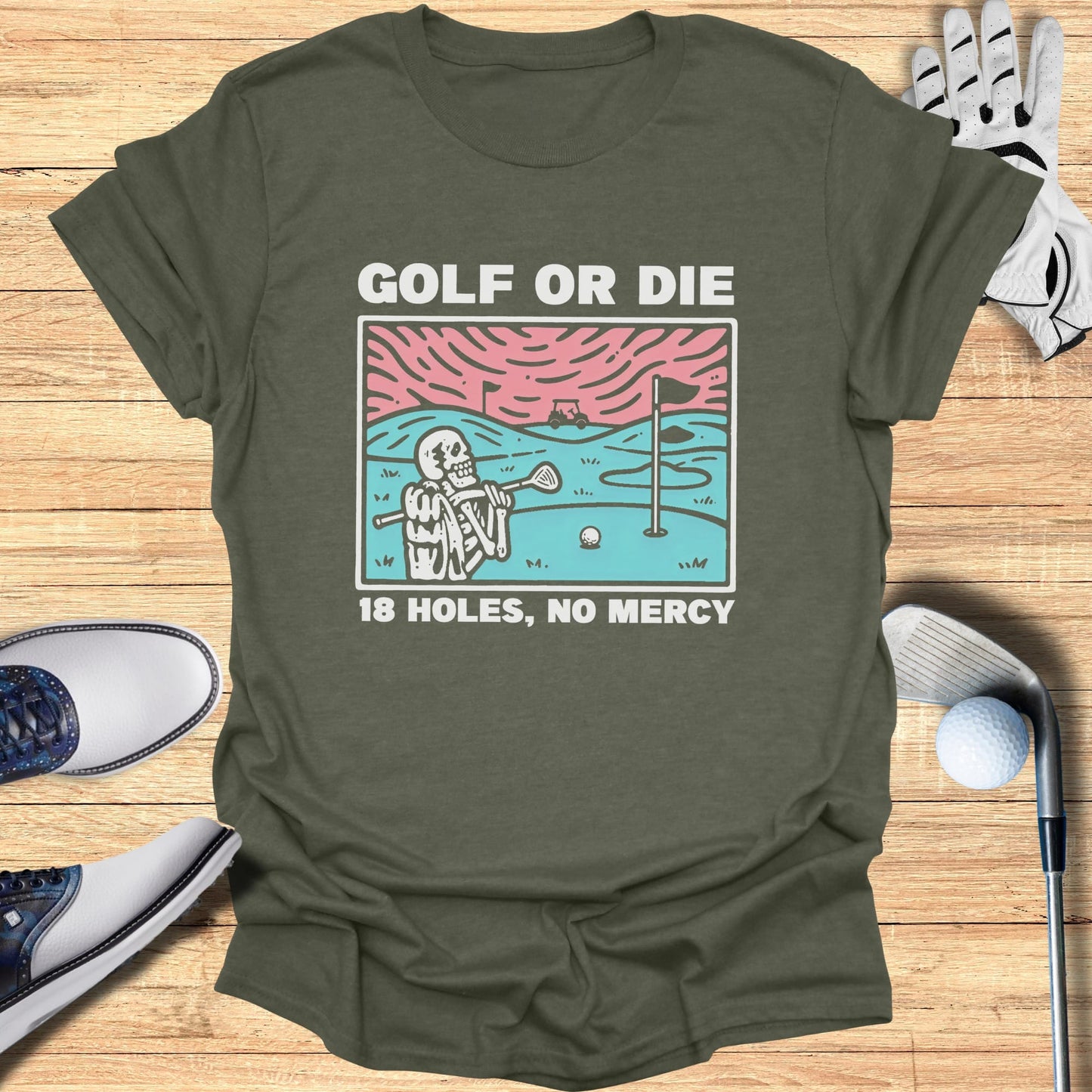 Skeleton golfer tee shirt with "GOLF OR DIE 18 HOLES, NO MERCY" text.