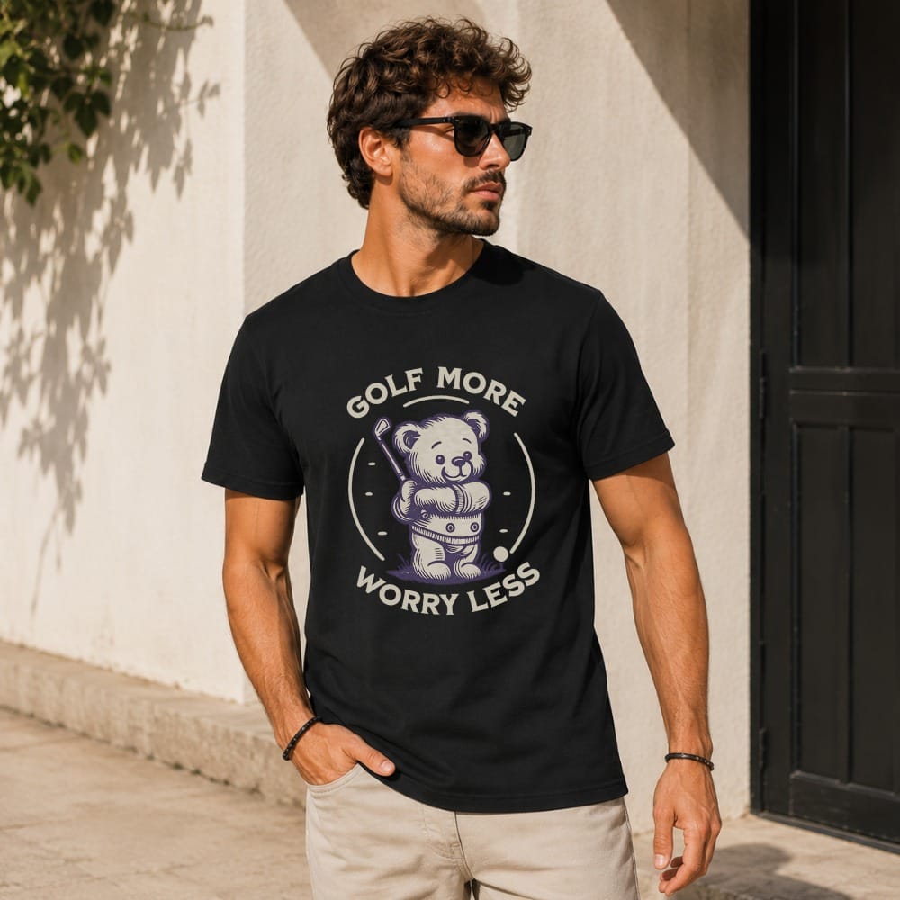 Black t-shirt with a cartoon bear and "Golf More Worry Less" text.