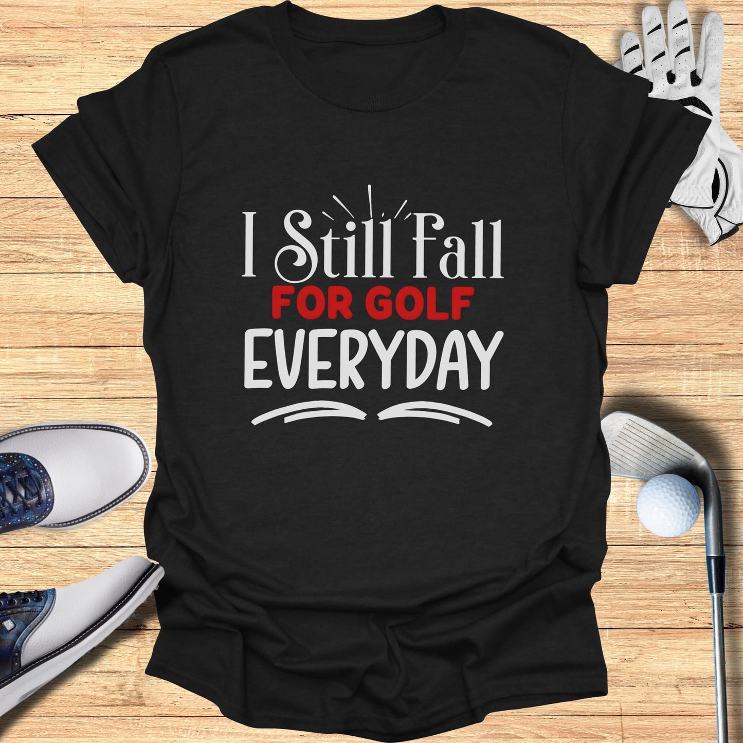 Black t-shirt with white and red text "I Still Fall For GOLF EVERYDAY".
