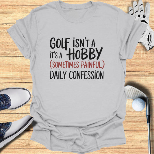 Grey t-shirt with "Golf isn't a hobby, it's a (sometimes painful) daily confession" text.
