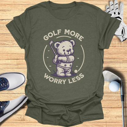 T-shirt with a cartoon bear swinging a golf club.