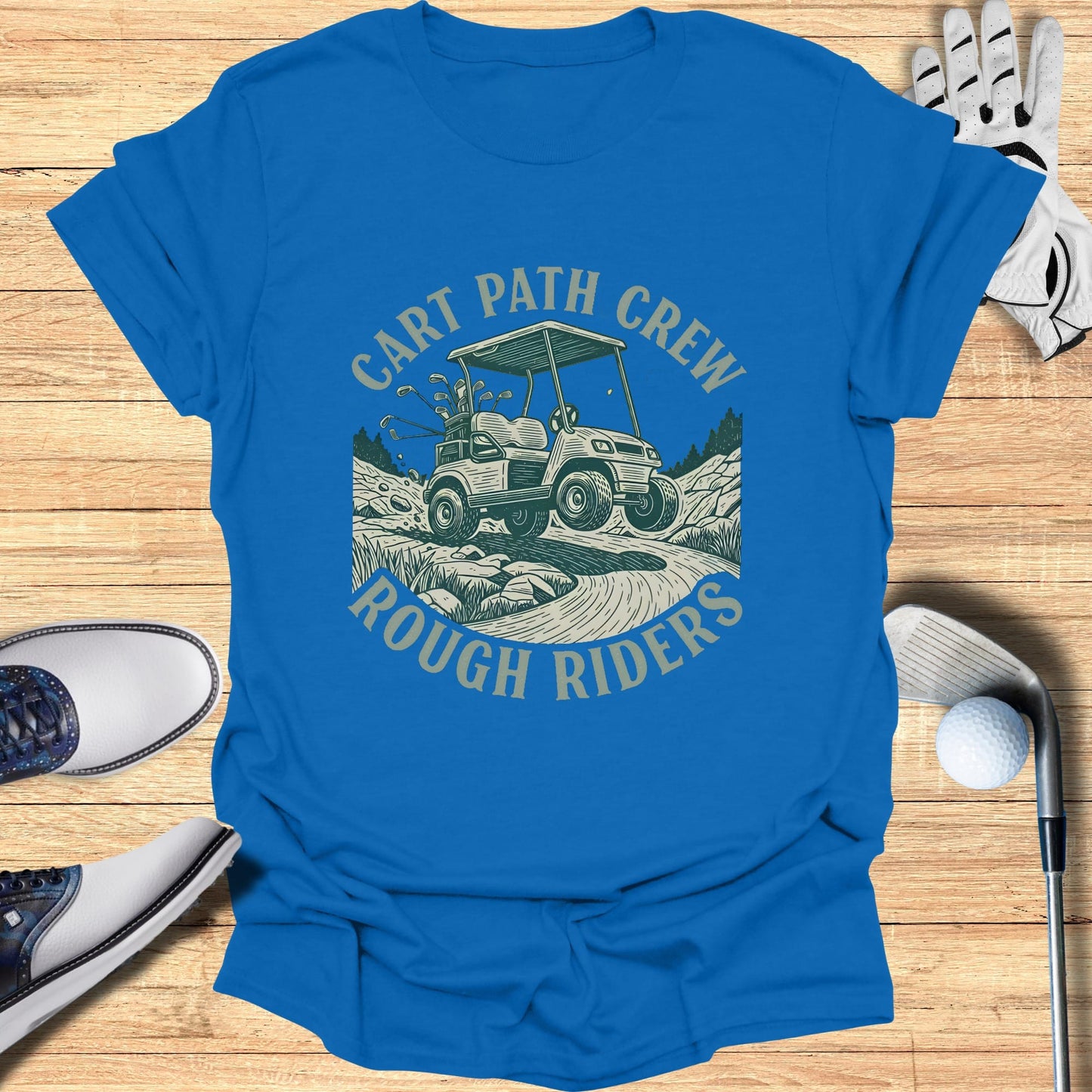 Golf cart with "Cart Path Crew Rough Riders" text on blue t-shirt.