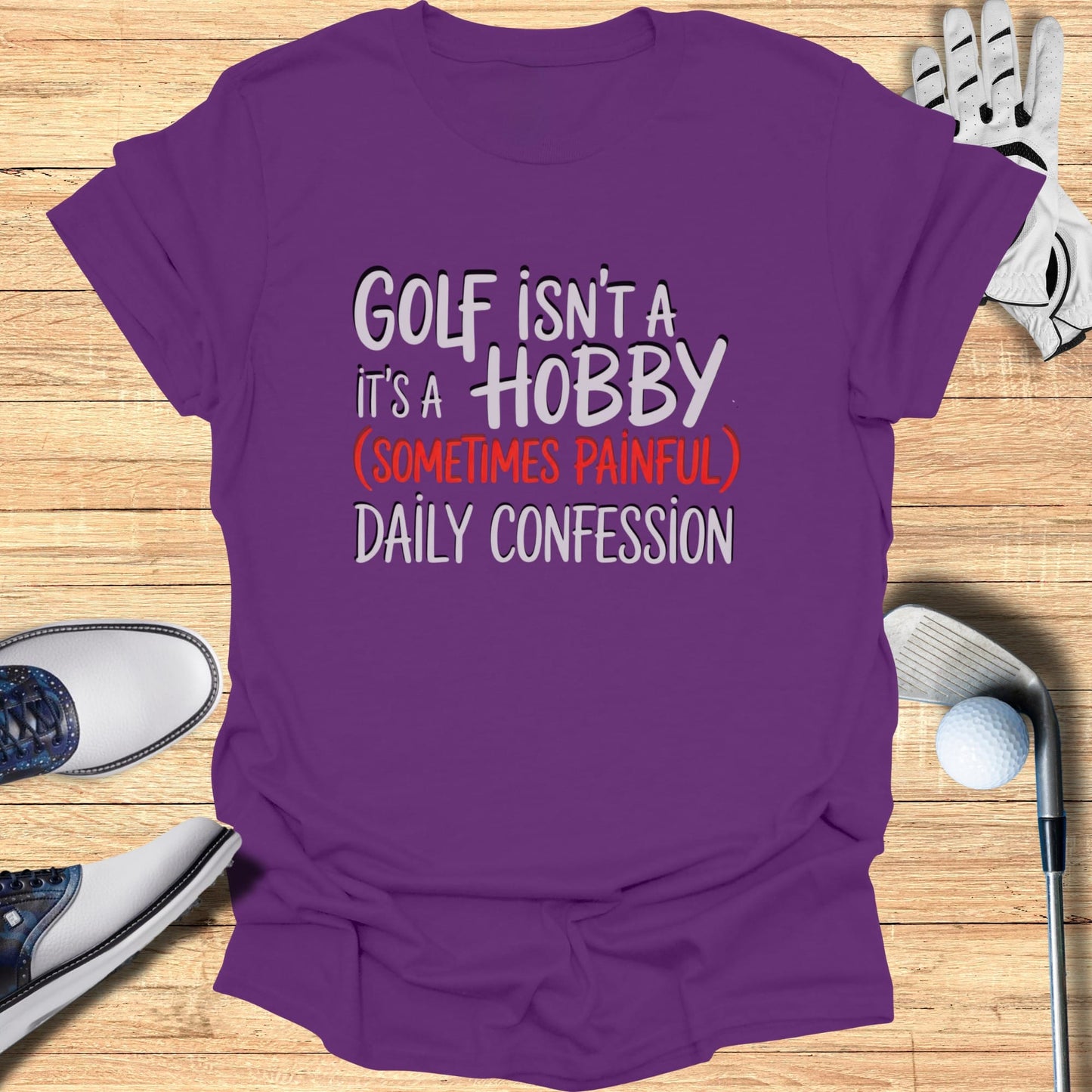 Purple t-shirt with "Golf Isn't a Hobby (Sometimes Painful) Daily Confession" text.