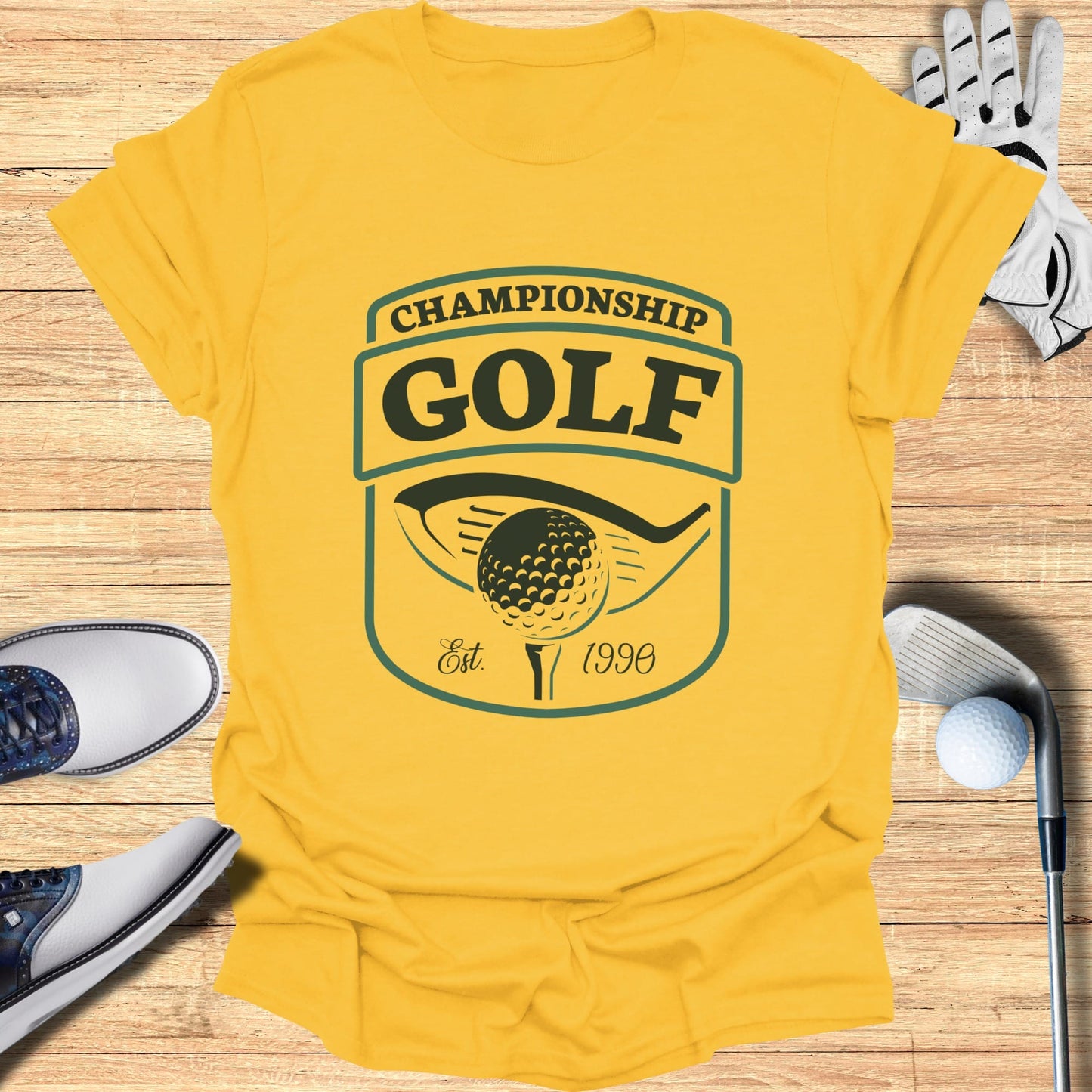 Yellow t-shirt with "Championship Golf Est. 1990" logo and golf accessories.
