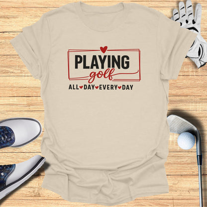 T-shirt with "Playing Golf All Day Every Day" text and golf accessories.