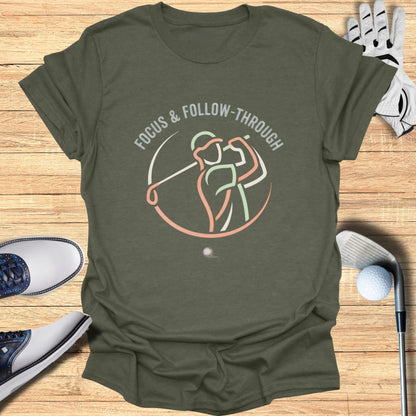 T-shirt with a circular graphic of a golfer swinging and the text "FOCUS & FOLLOW-THROUGH".