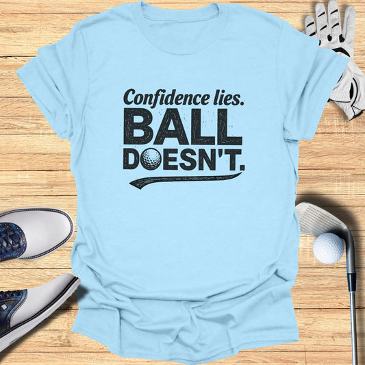 Light blue t-shirt with "Confidence lies. BALL DOESN'T." text and golf accessories.