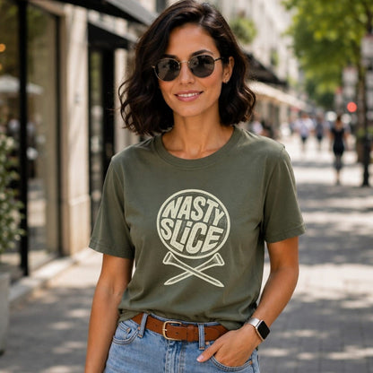 Woman wearing a green t-shirt with "NASTY SLICE" and crossed golf clubs.