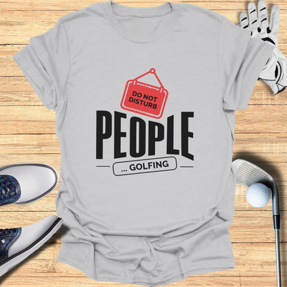 Gray t-shirt with "DO NOT DISTURB ... GOLFING" text and red sign.
