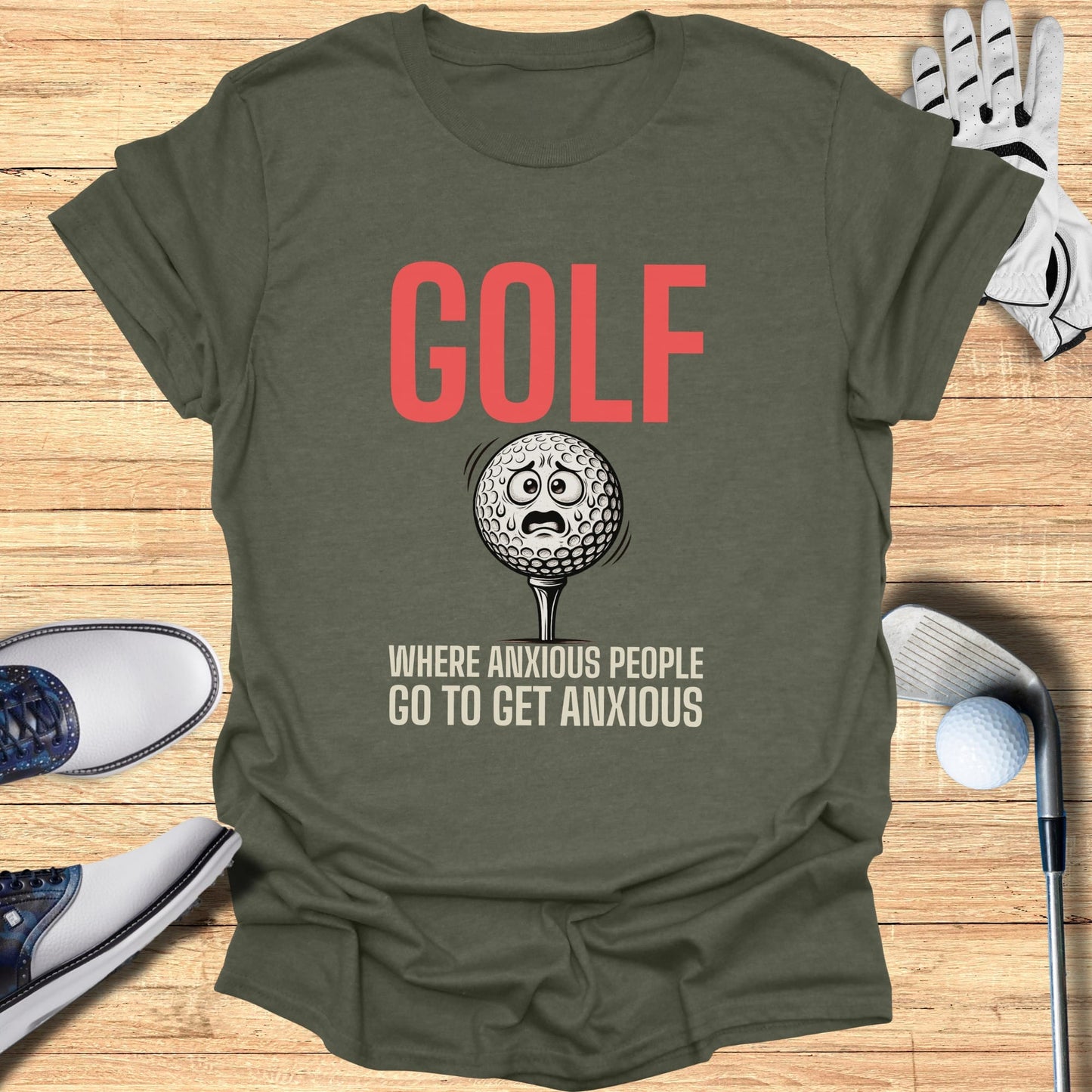 Green t-shirt with "GOLF WHERE ANXIOUS PEOPLE GO TO GET ANXIOUS" text.